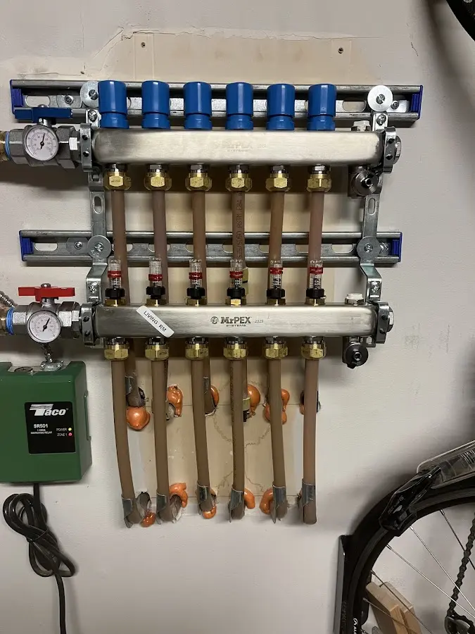 Plumber performing Gas Leak Detection at a residential property in Middlesex